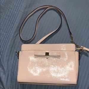 Pink kate spade purse with shoulder strap